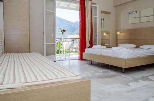 Imagen de la habitación del Hotel Happyland Apartments. Foto 7