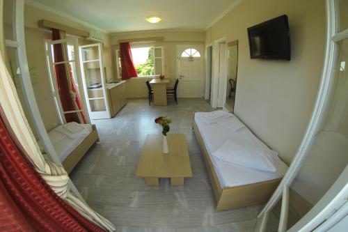 Imagen de la habitación del Hotel Happyland Apartments. Foto 8