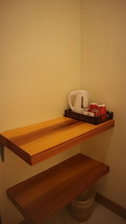Imagen de la habitación del Hotel Haramayne Suites. Foto 18