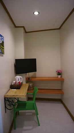 Imagen de la habitación del Hotel Haramayne Suites. Foto 22