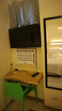 Imagen de la habitación del Hotel Haramayne Suites. Foto 23