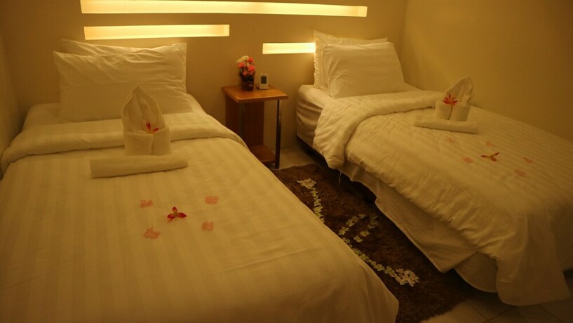 Imagen de la habitación del Hotel Haramayne Suites. Foto 26