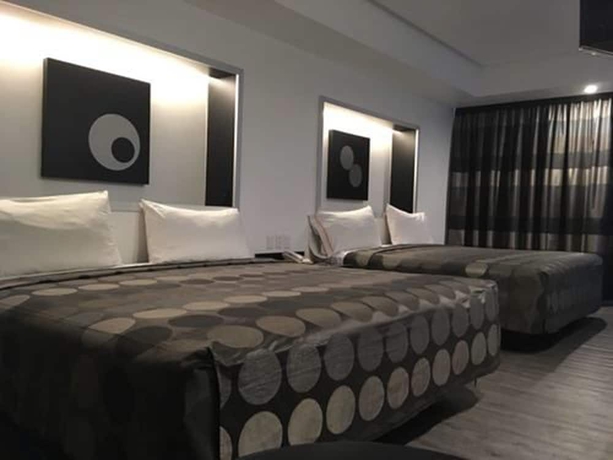 Imagen de la habitación del Hotel Harare. Foto 11