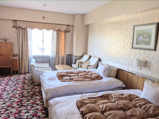 Imagen de la habitación del Hotel Harazuru Onsen Topmega Itoen. Foto 7
