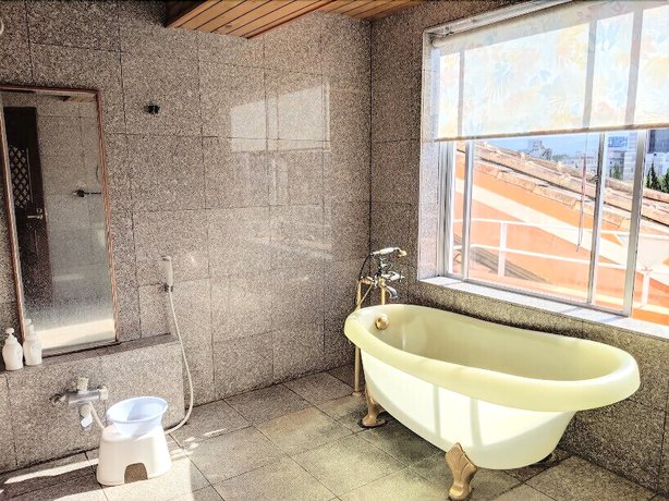 Imagen de la habitación del Hotel Harazuru Onsen Topmega Itoen. Foto 13
