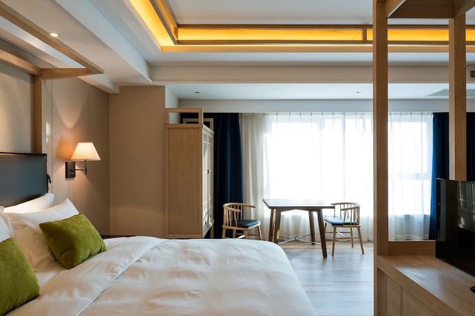 Imagen de la habitación del Hotel Harbin 22c Boutique. Foto 5