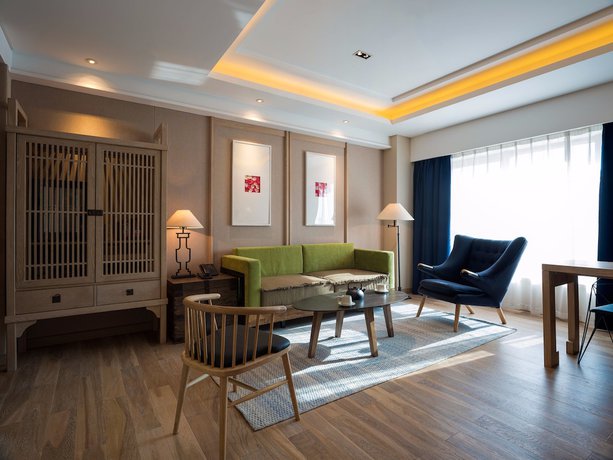 Imagen de la habitación del Hotel Harbin 22c Boutique. Foto 8