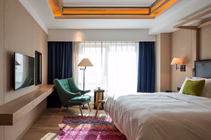 Imagen de la habitación del Hotel Harbin 22c Boutique. Foto 12