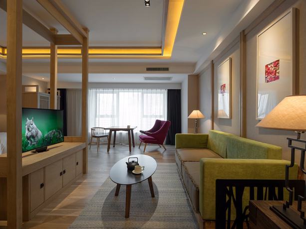 Imagen de la habitación del Hotel Harbin 22c Boutique. Foto 13