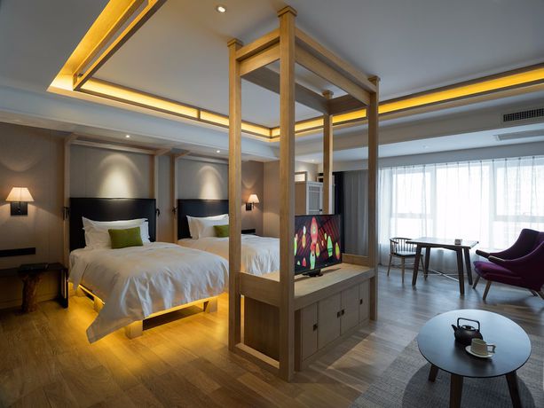 Imagen de la habitación del Hotel Harbin 22c Boutique. Foto 14