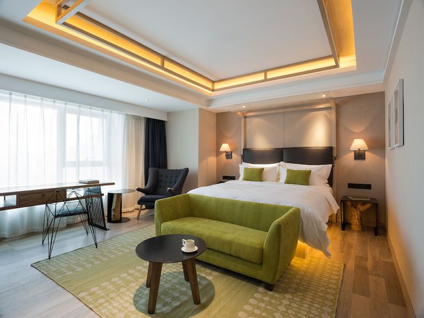 Imagen de la habitación del Hotel Harbin 22c Boutique. Foto 15
