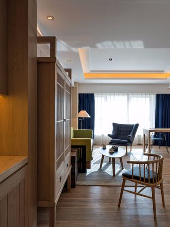 Imagen de la habitación del Hotel Harbin 22c Boutique. Foto 16