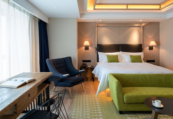 Imagen de la habitación del Hotel Harbin 22c Boutique. Foto 17