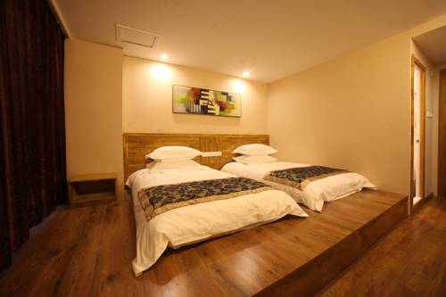 Imagen de la habitación del Hotel Harbin Beibei Holiday Central Street. Foto 4