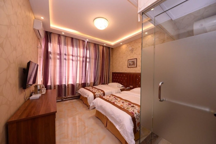 Imagen de la habitación del Hotel Harbin Bincheng Jiahua. Foto 4