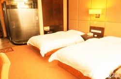 Imagen de la habitación del Hotel Harbin Feilong International Business Hotel. Foto 5