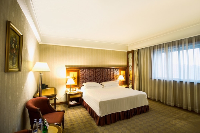 Imagen de la habitación del Hotel Harbin Fortune Days. Foto 7