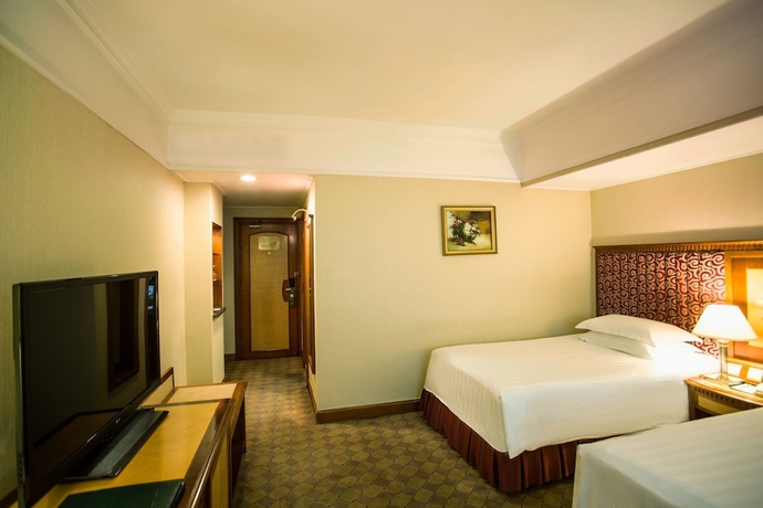 Imagen de la habitación del Hotel Harbin Fortune Days. Foto 8