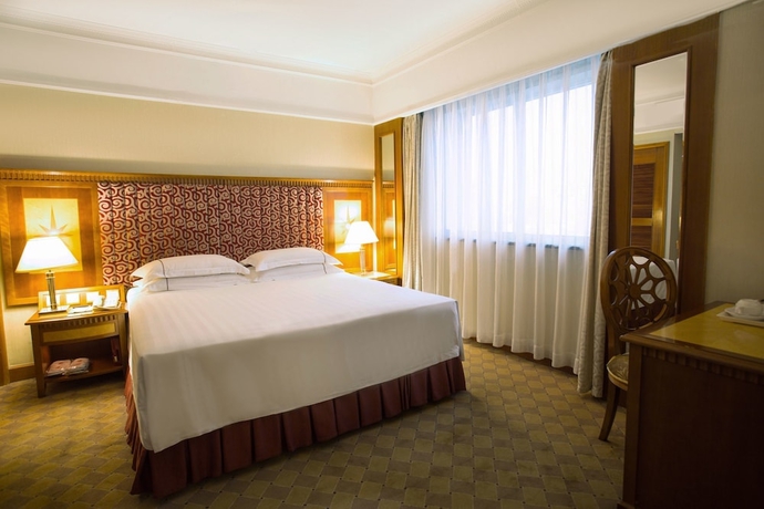 Imagen de la habitación del Hotel Harbin Fortune Days. Foto 9