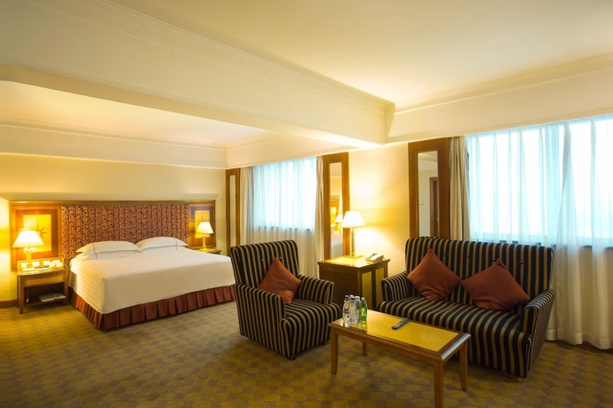 Imagen de la habitación del Hotel Harbin Fortune Days. Foto 11