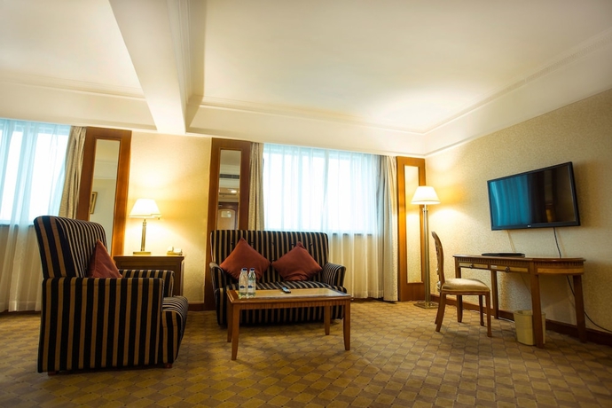 Imagen de la habitación del Hotel Harbin Fortune Days. Foto 13