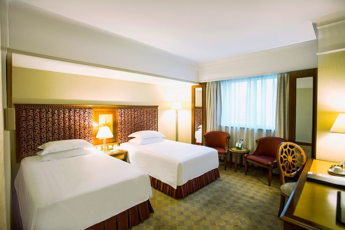 Imagen de la habitación del Hotel Harbin Fortune Days. Foto 15