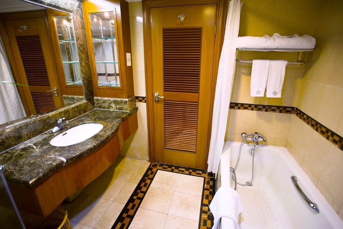 Imagen de la habitación del Hotel Harbin Fortune Days. Foto 17