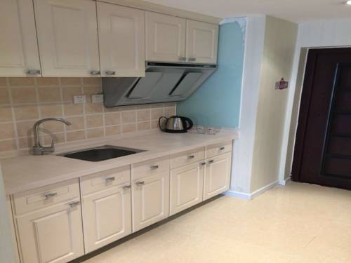 Imagen de la habitación del Hotel Harbin Haxi Mingren Apartment. Foto 2