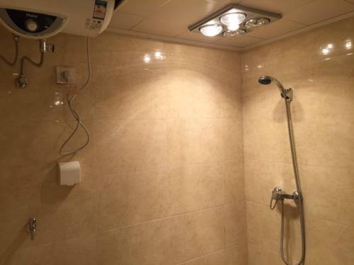 Imagen de la habitación del Hotel Harbin Haxi Mingren Apartment. Foto 4