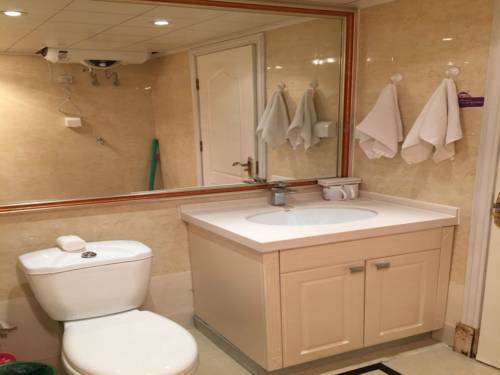 Imagen de la habitación del Hotel Harbin Haxi Mingren Apartment. Foto 5