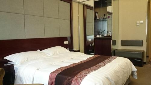 Imagen de la habitación del Hotel Harbin Jingu Hotel. Foto 6