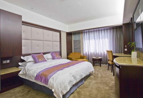 Imagen de la habitación del Hotel Harbin Jingu Hotel. Foto 10