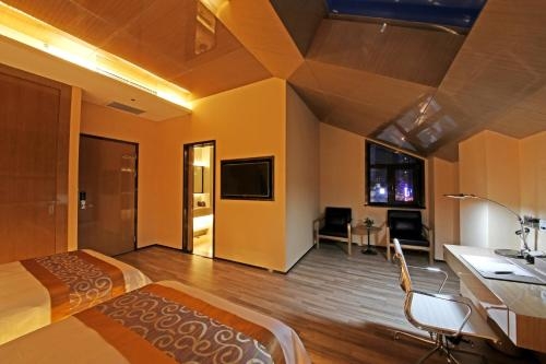 Imagen de la habitación del Hotel Harbin Kai Rui. Foto 10