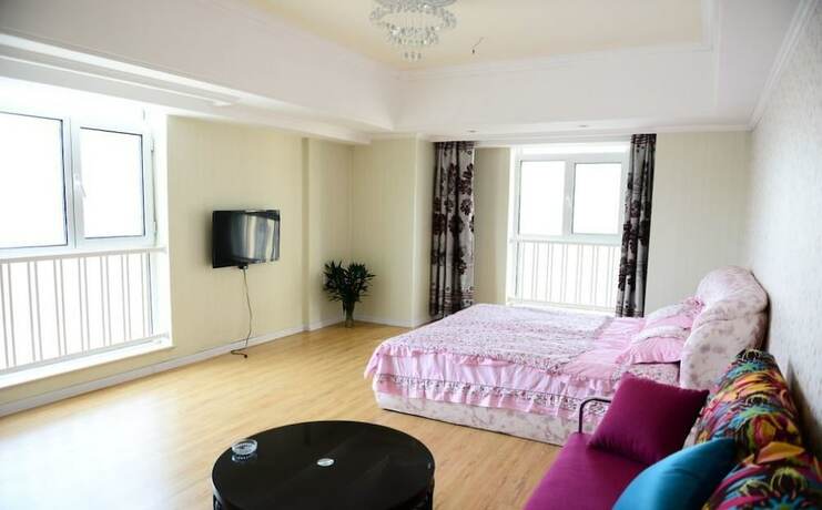 Imagen de la habitación del Hotel Harbin Rose Apartment. Foto 14