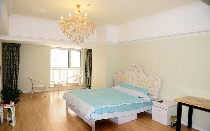 Imagen de la habitación del Hotel Harbin Rose Apartment. Foto 16