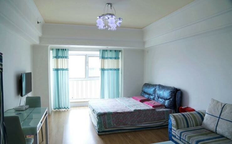 Imagen de la habitación del Hotel Harbin Rose Apartment. Foto 19