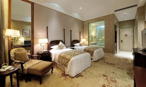 Imagen de la habitación del Hotel Harbin Sun Island Garden. Foto 6