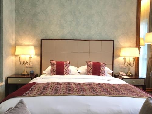 Imagen de la habitación del Hotel Harbin Sun Island Garden. Foto 7