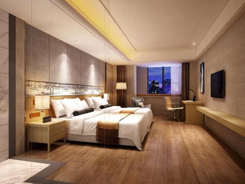 Imagen de la habitación del Hotel Harbin Sydcn. Foto 6