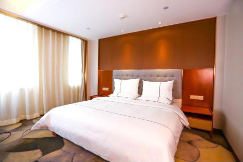 Imagen de la habitación del Hotel Harbin Sydcn. Foto 9