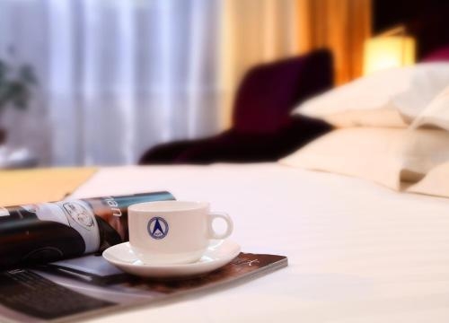 Imagen de la habitación del Hotel Harbin Victories. Foto 10