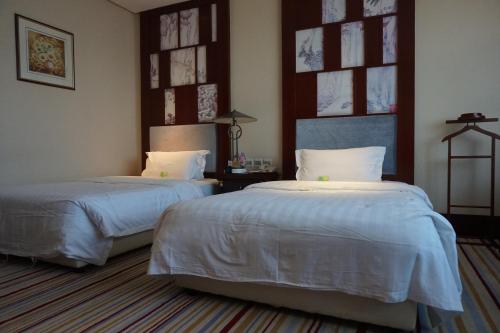 Imagen general del Hotel Harbin Zhengming Jinjiang. Foto 3