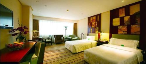 Imagen de la habitación del Hotel Harbin Zhengming Jinjiang. Foto 7