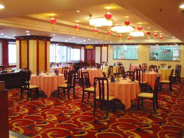 Imagen del bar/restaurante del Hotel Harbin Zhengming Jinjiang Hotel. Foto 5