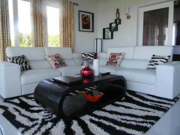 Imagen de la habitación del Hotel Harbor Breeze Villas. Foto 12