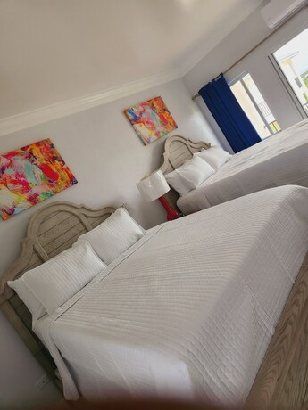 Imagen de la habitación del Hotel Harbor Breeze Villas. Foto 15