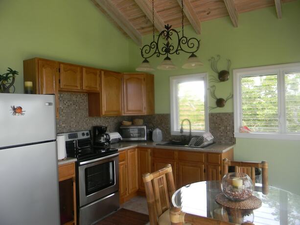 Imagen de la habitación del Hotel Harbor Breeze Villas. Foto 17
