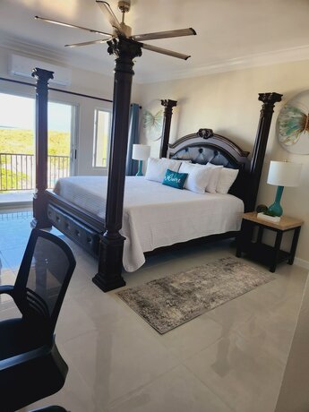 Imagen de la habitación del Hotel Harbor Breeze Villas. Foto 19