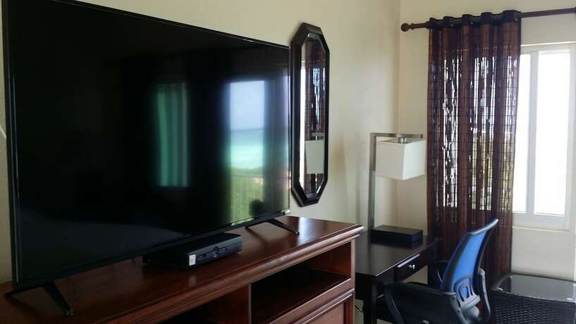 Imagen de la habitación del Hotel Harbor Breeze Villas. Foto 20
