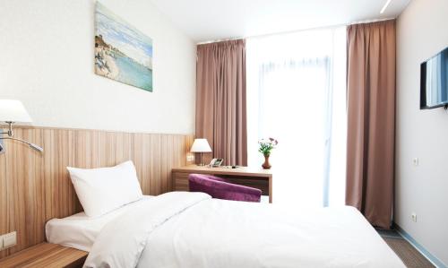 Imagen de la habitación del Hotel Harbor Club, Tsentralny. Foto 6